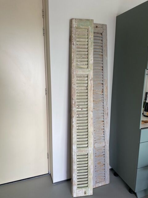 Old wooden french louvre shutters