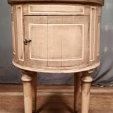 Round bedside table painted in trompe l'oeil
