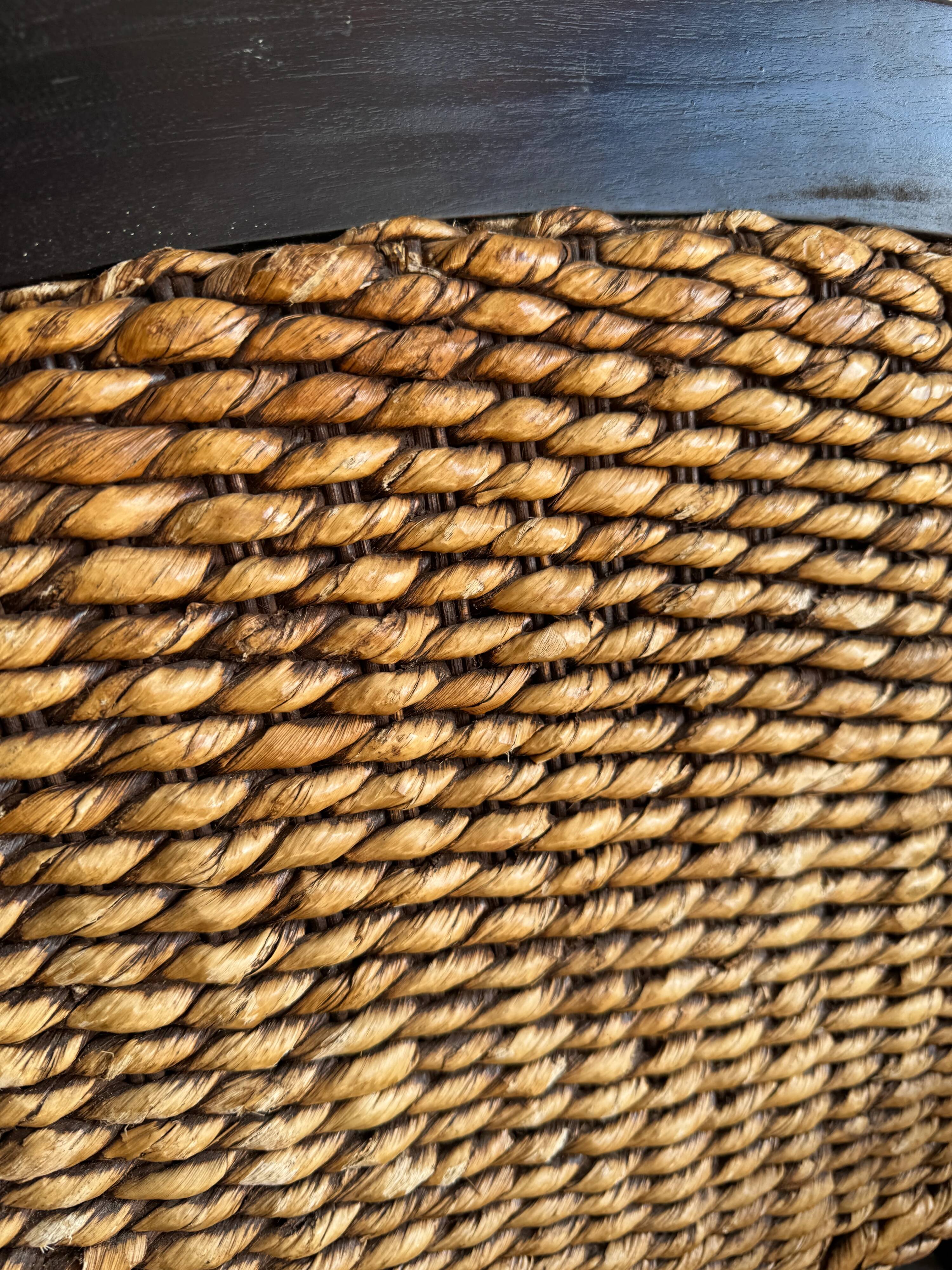 Set of two colonial dark-brown wooden armchairs with natural rattan seating (pair)