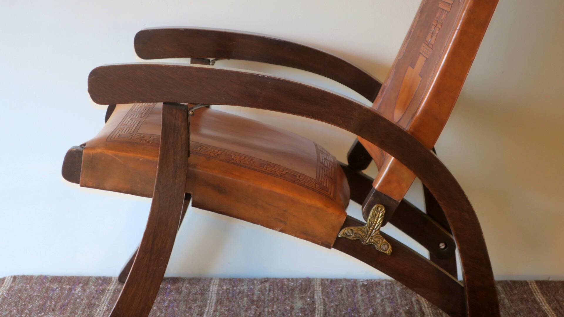 Tiahuanaco design tooled leather folding armchair by Angel Pazmino, Ecuador