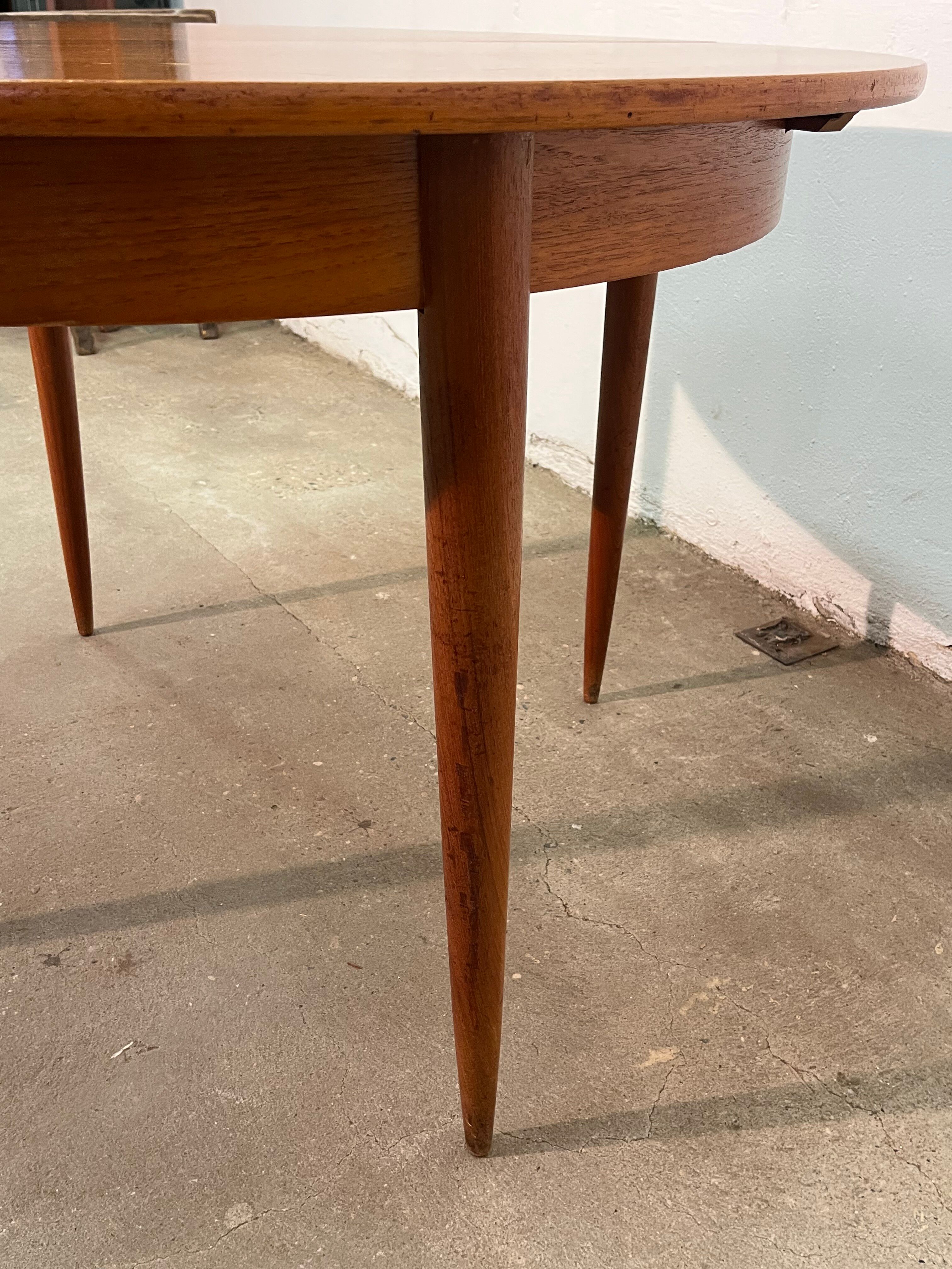 Vintage 1960s teak extendable Scandinavian table.