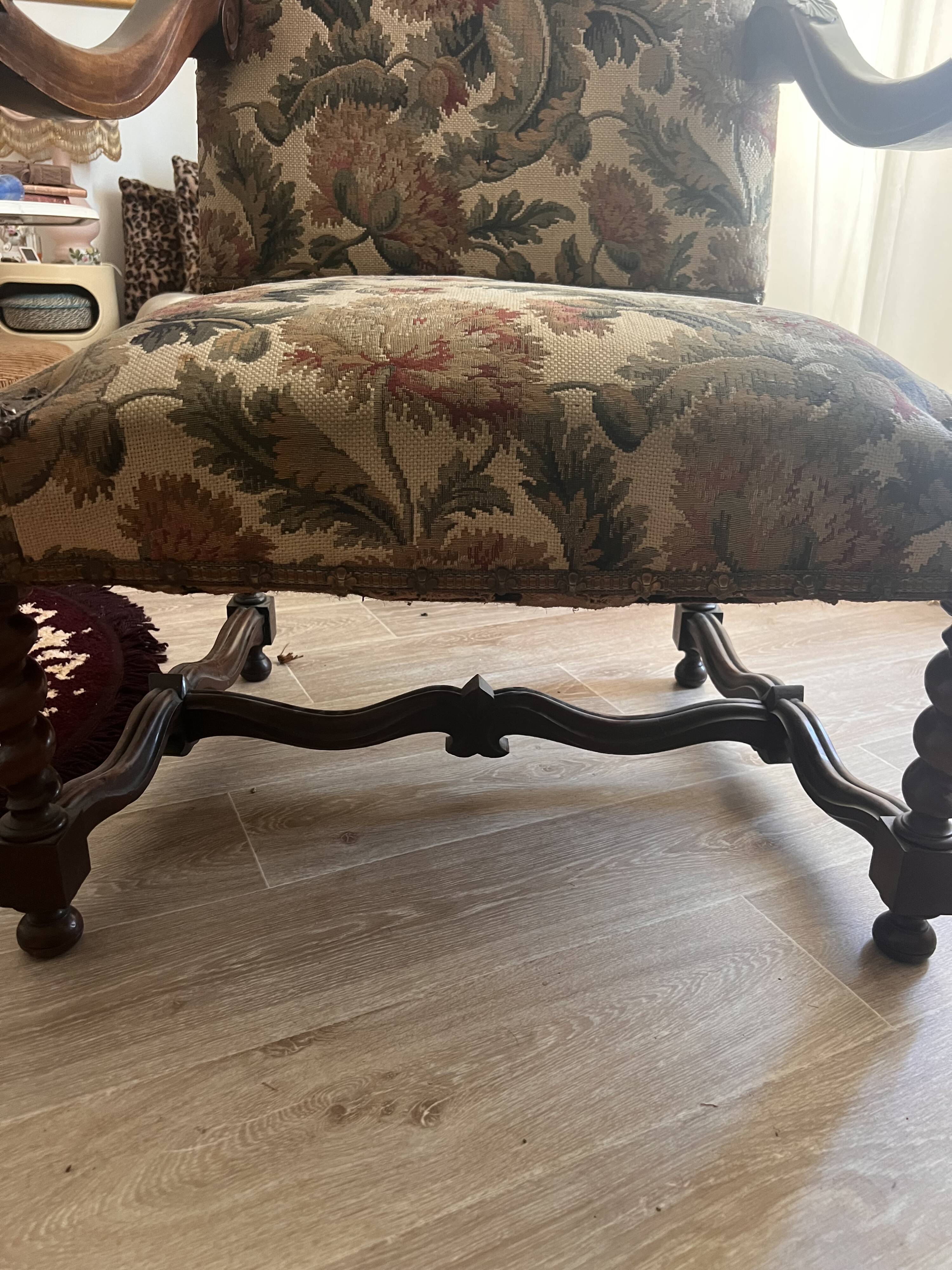 Antique armchair in Henri II style with masks