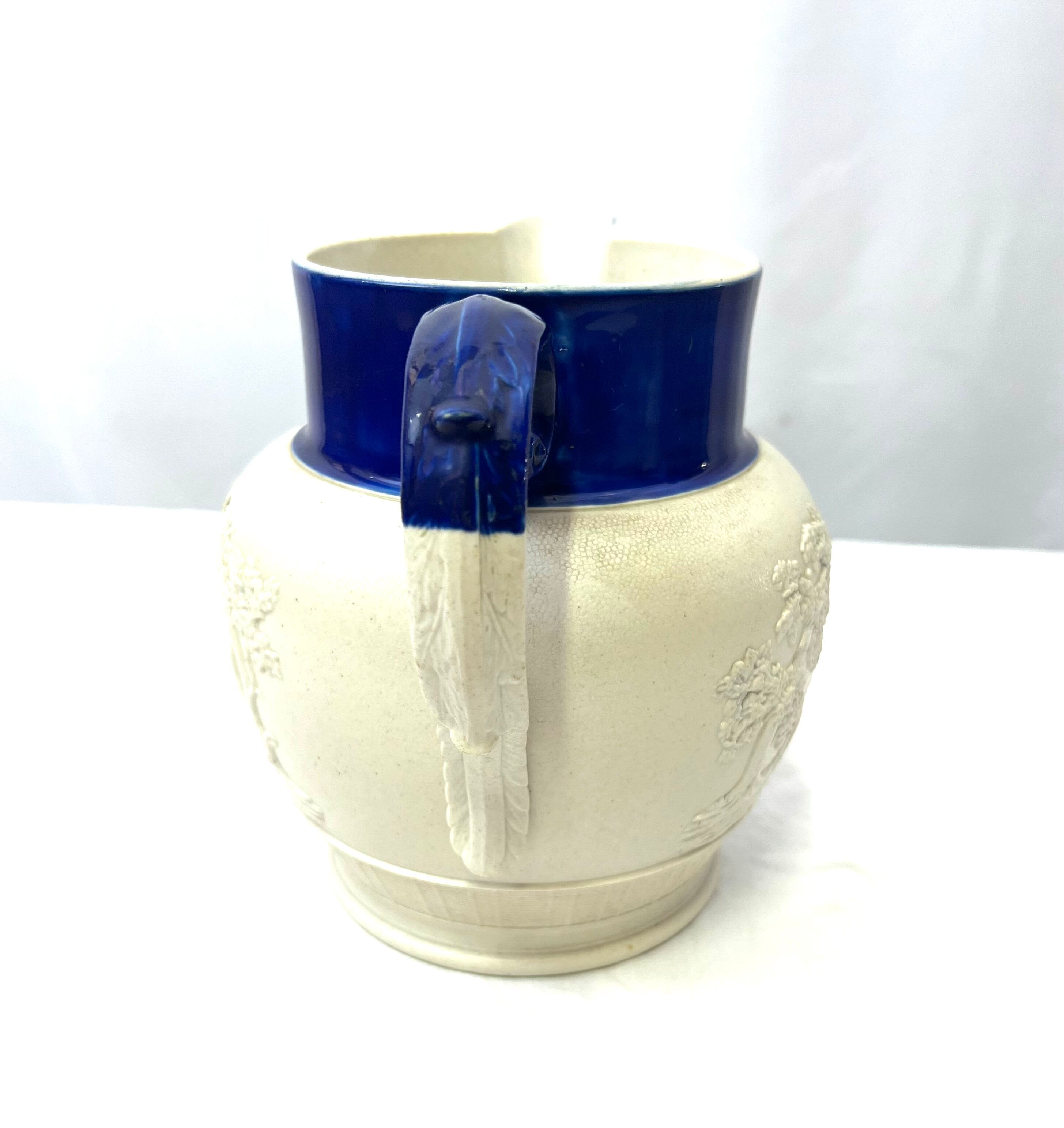 White pitcher blue pattern horses dog style Wedgwood
