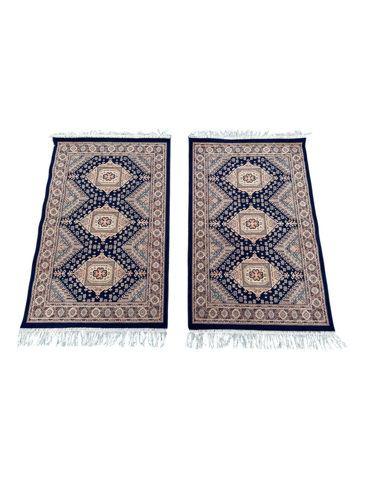Pair of oriental rugs 110cm x 70cm