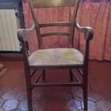 Old rustic straw armchair
