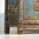 Old wooden entrance buffet in blue and yellow tones (circa 1920).