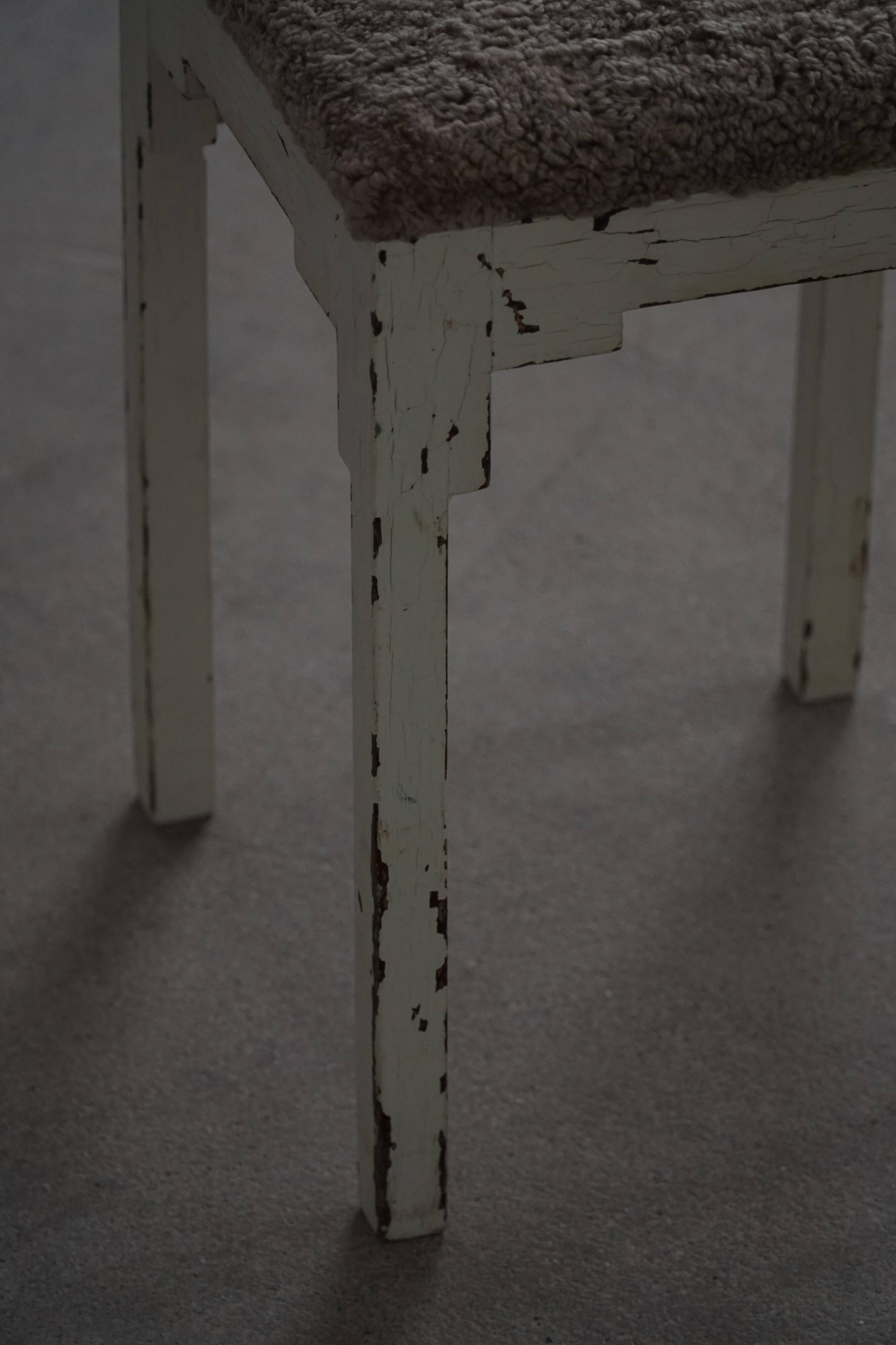 A pair of antique Danish stools, seats in lambswool, late 19th century.