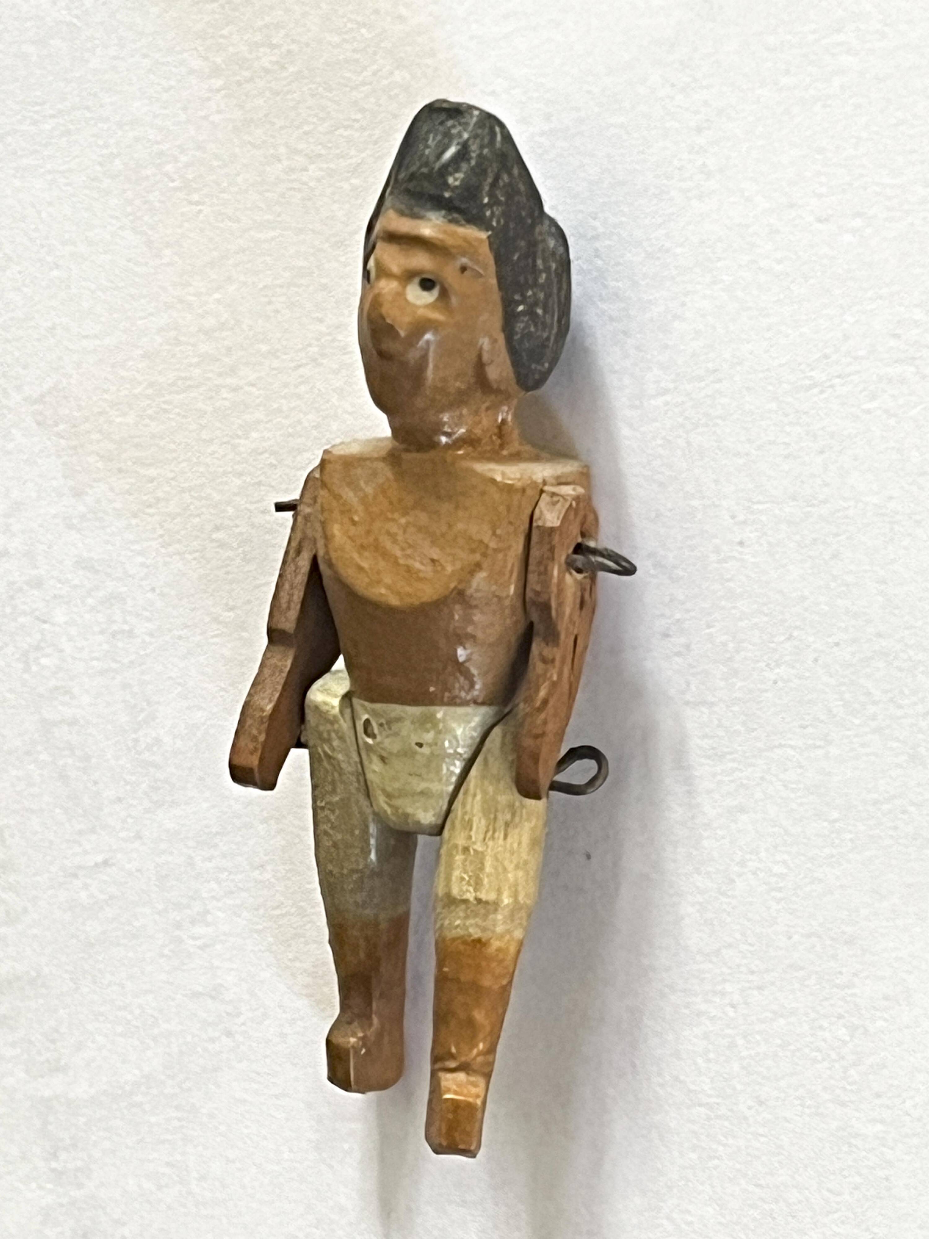 Painted wooden Indian figure, French brand Radiguet, vintage toy.