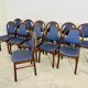 Lot de 12 chaises Baumann vintage assise Skaï bleu