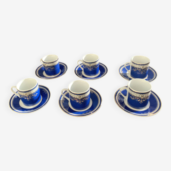 Porcelain coffee service, composed of 12 pieces, 6 cups and 6 saucers, royal blue color