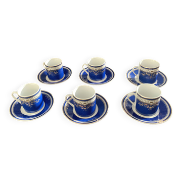 Porcelain coffee service, composed of 12 pieces, 6 cups and 6 saucers, royal blue color