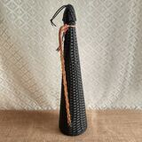 Glass bottle covered with black scoubidou with twisted golden handle - vintage