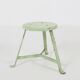 Industrial green painted stool with steel base and wooden top, France 1930s