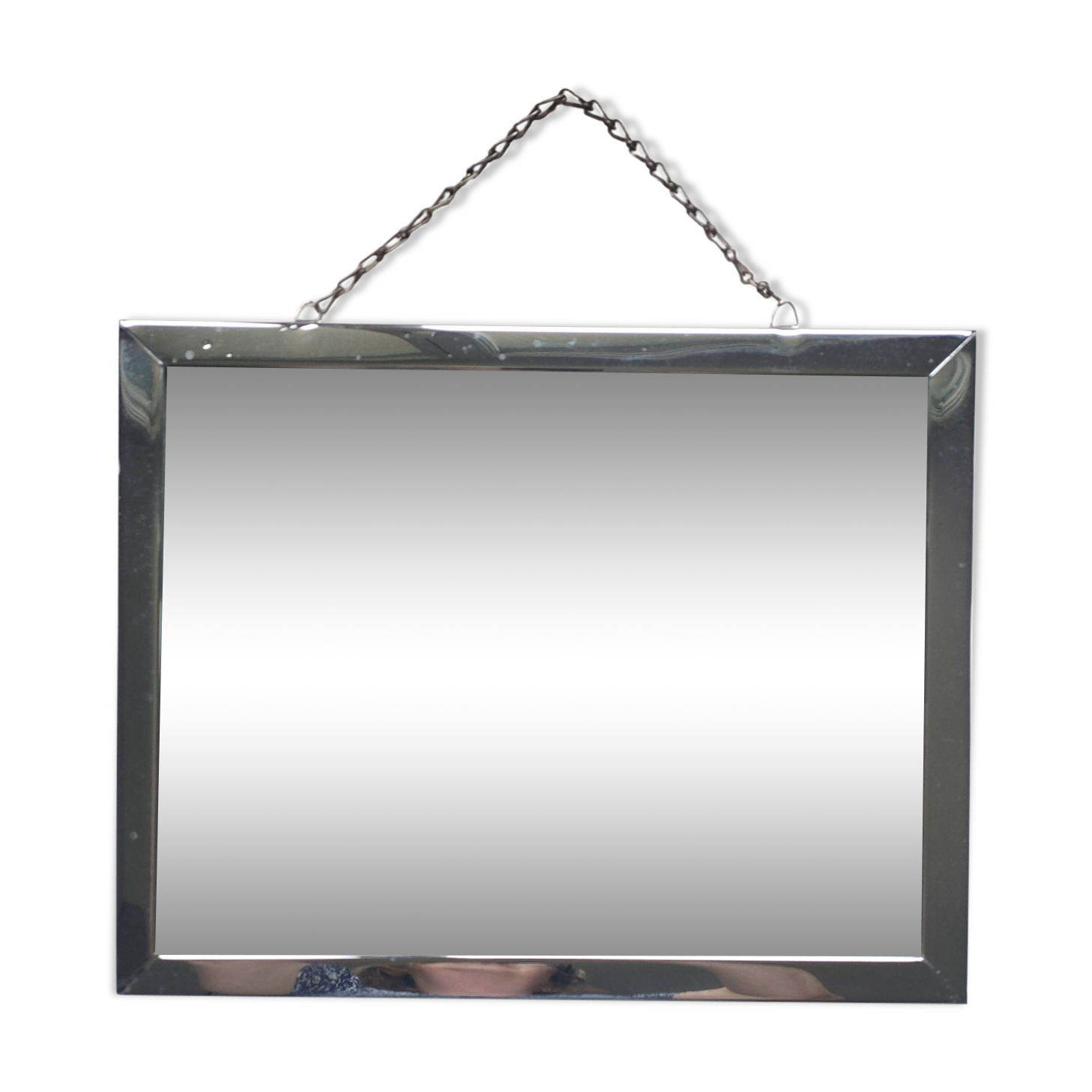 Barber mirror with chain.