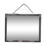 Barber mirror with chain.