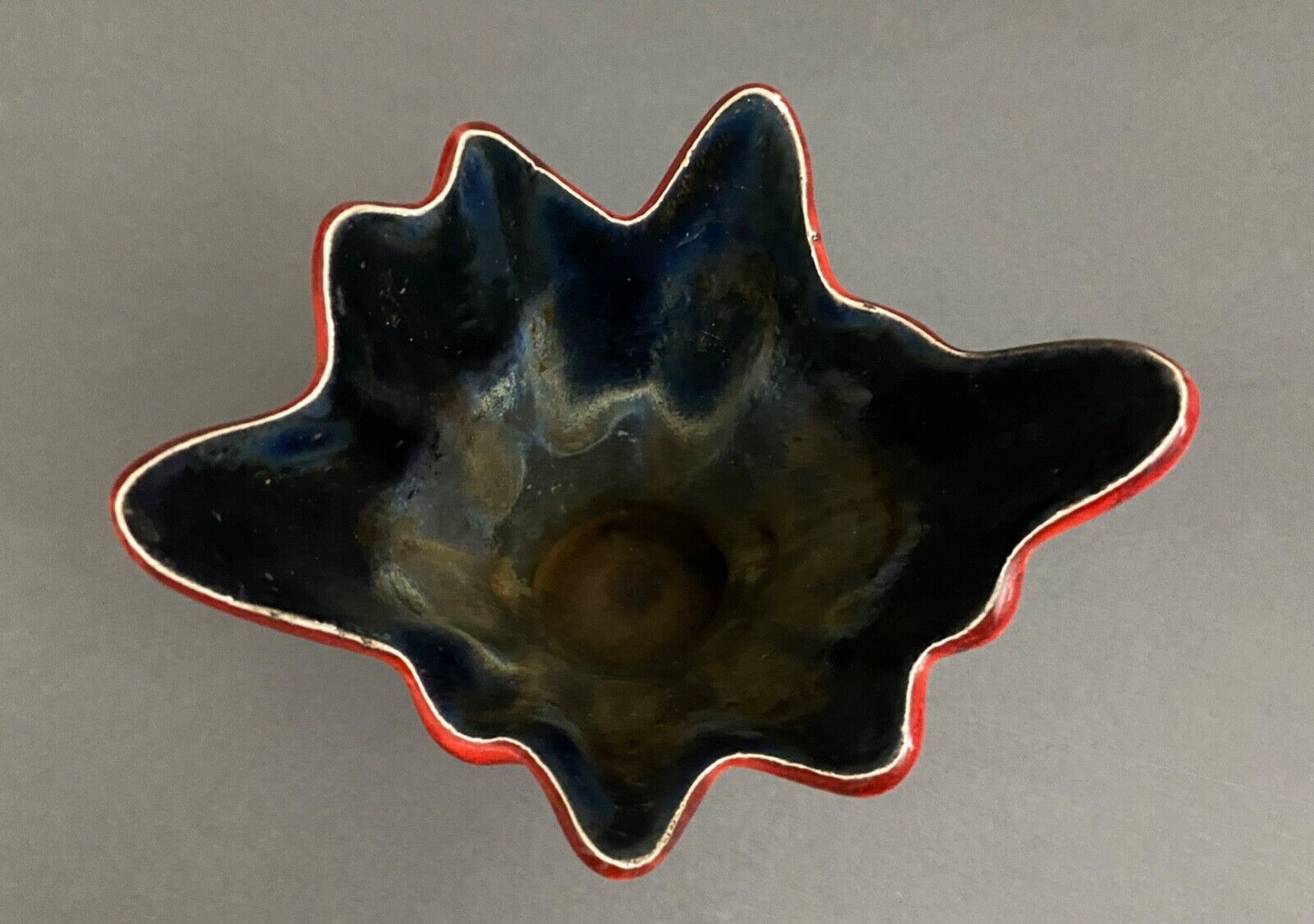 Free form red ceramic vase 1960 by J.L. or J.C.