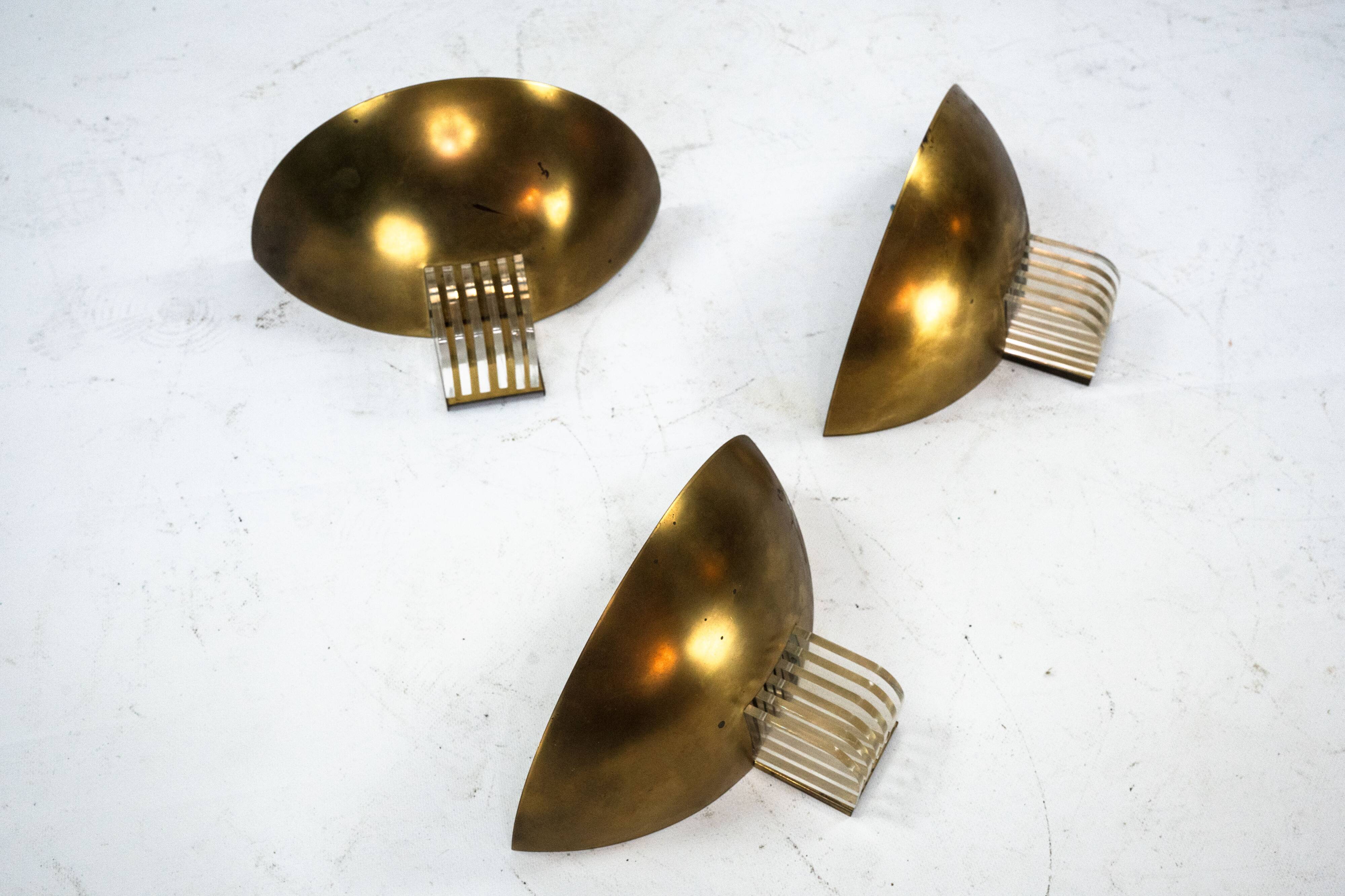 Set of three Italian Deco-style brass wall sconces, Italy 1970s