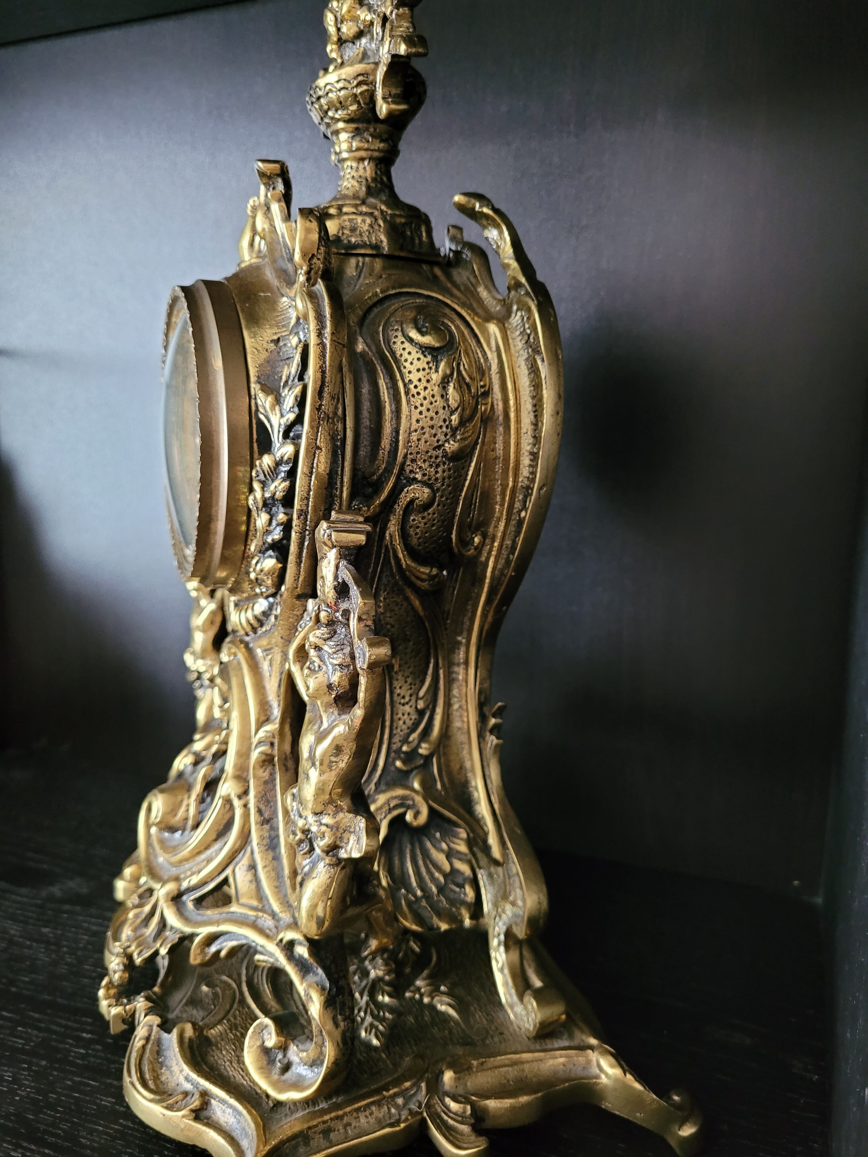 Louis XV style gilded bronze clock