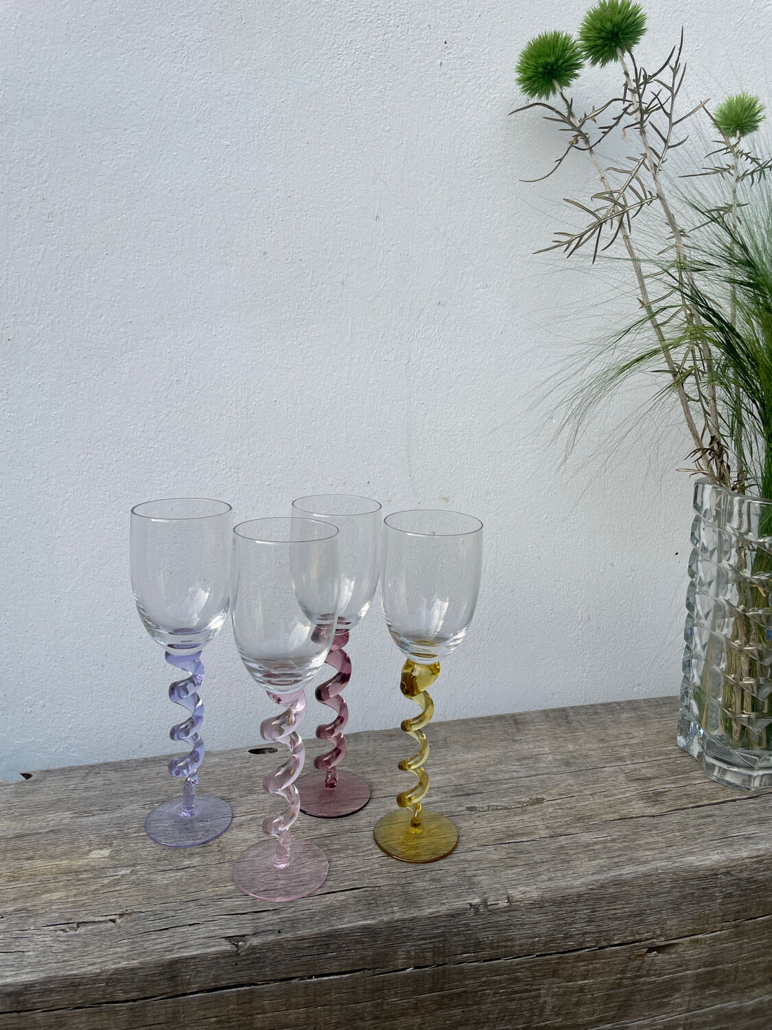 4 large, multicoloured, twisted champagne flutes
