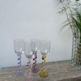 4 large, multicoloured, twisted champagne flutes
