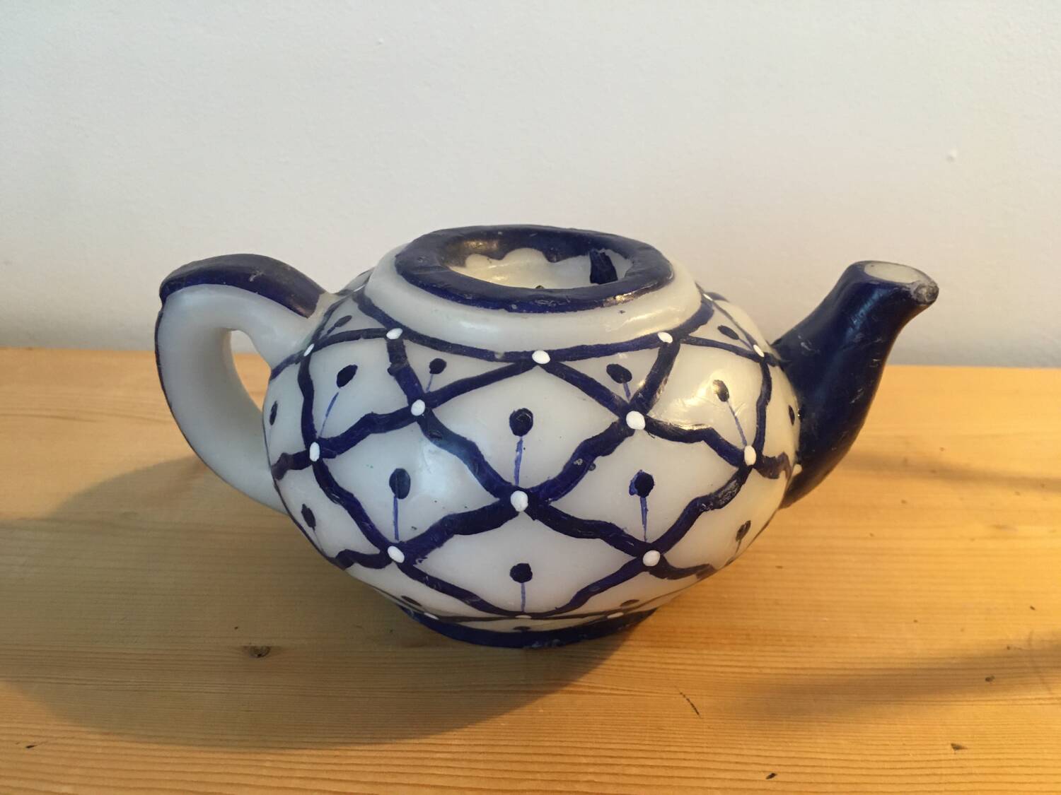 Vintage teapot shaped candle.