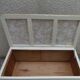 Re-enchanted vintage toy chest in beige, wooden tray.