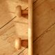 Vintage wall coat rack in pine with 2 hooks.