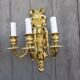 Pair of antique bronze wall sconces from the Napoleonic III era in the Louis XVI style.