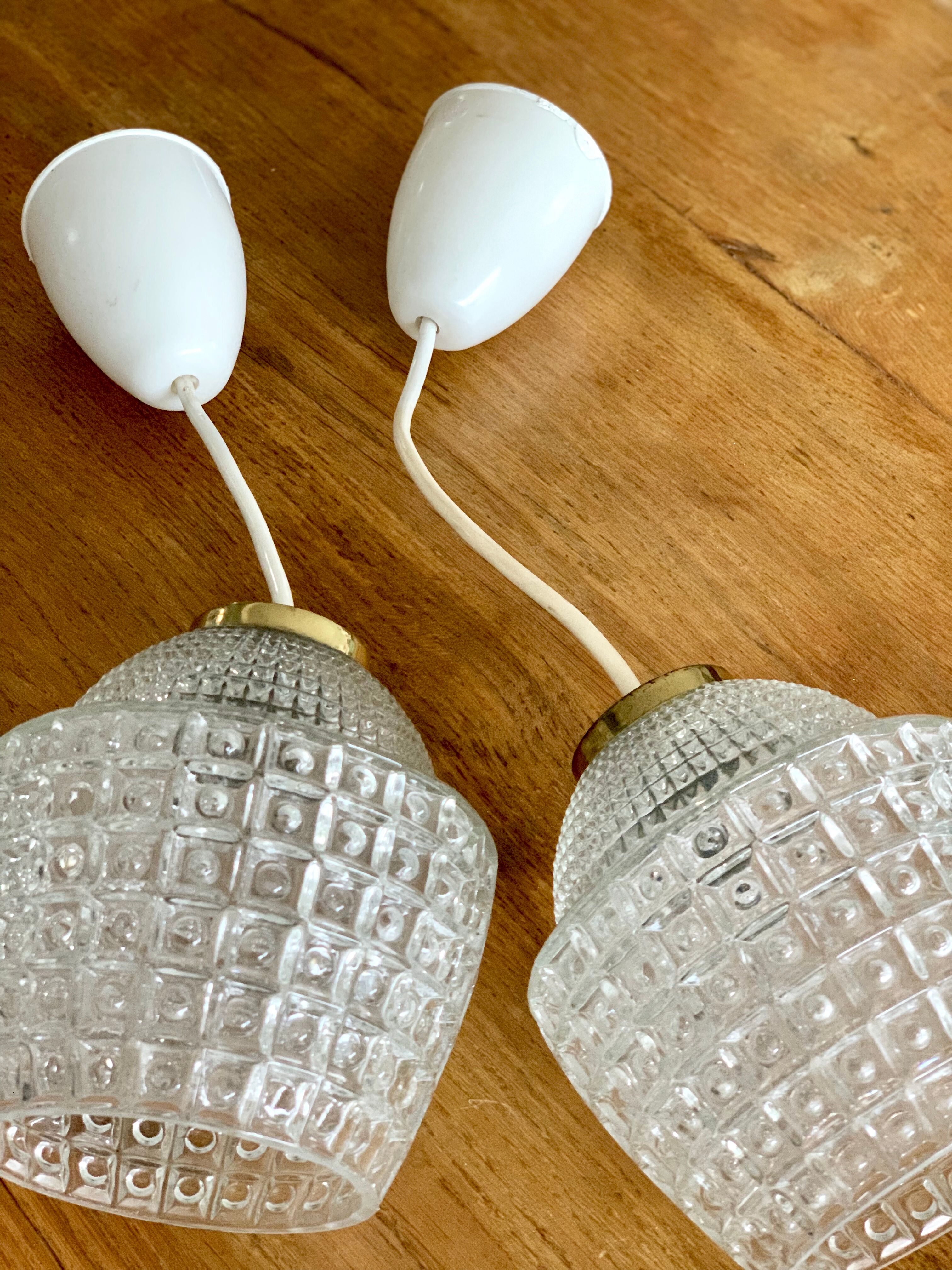 Pair of glass and vintage brass suspension