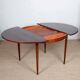 Round extendable dining table in Rio rosewood, 1960