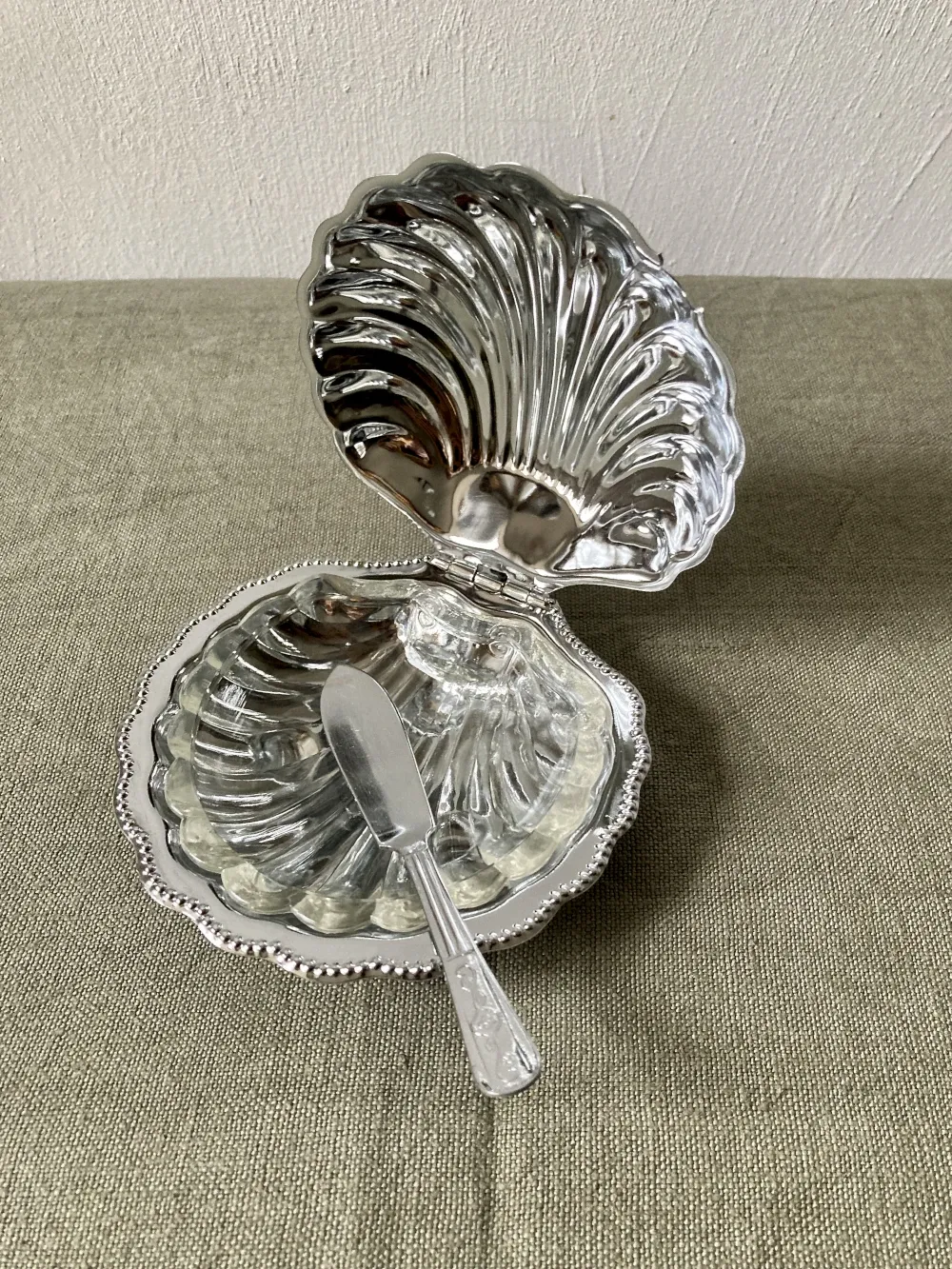 Metal shell butter dish with glass bowl and knife