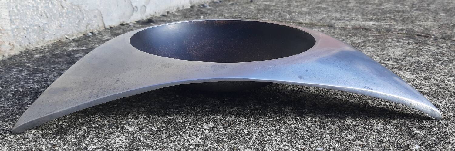 Cast aluminum ashtray or pocket emptier