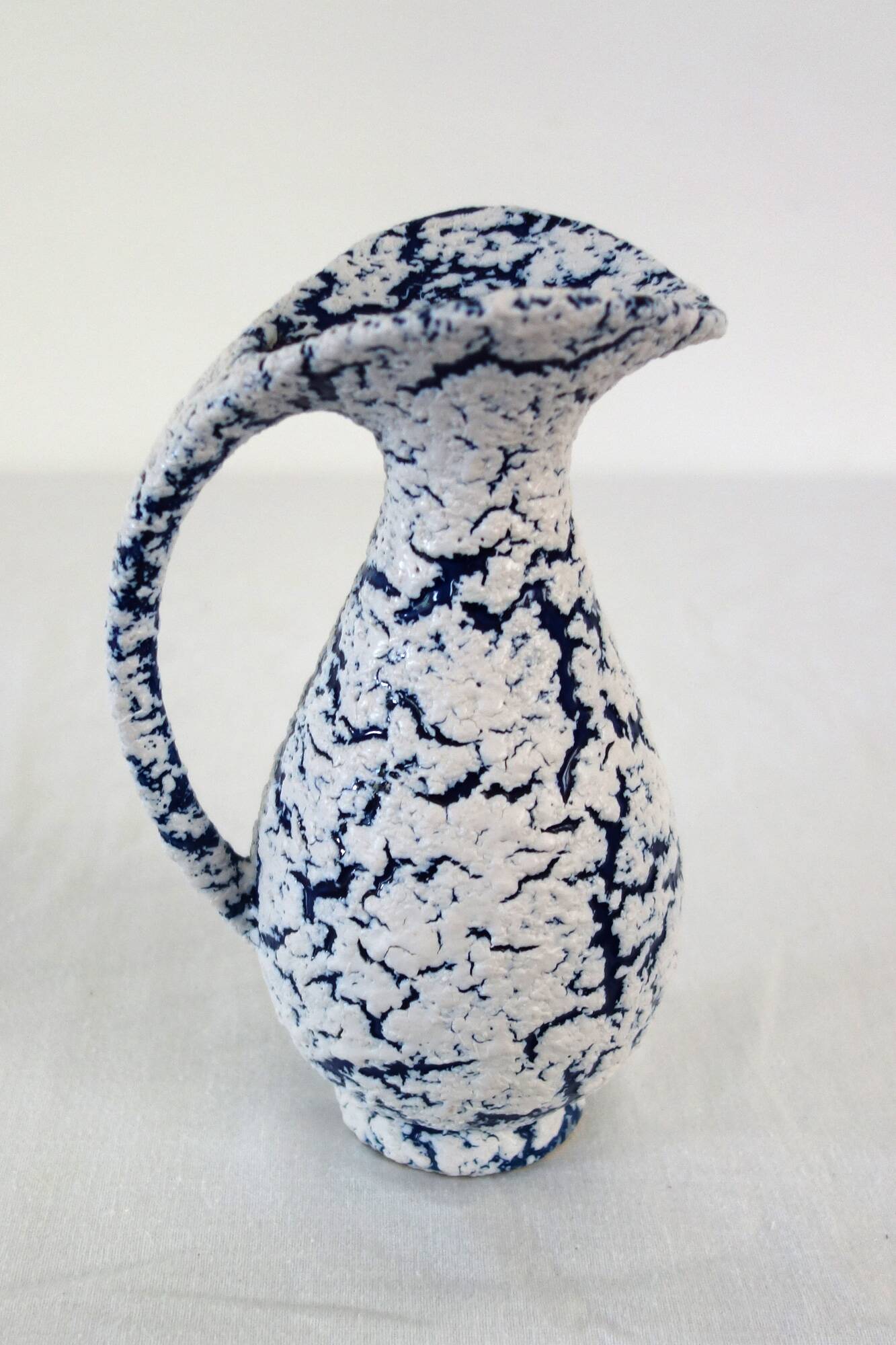 Small vintage snow stoneware vase