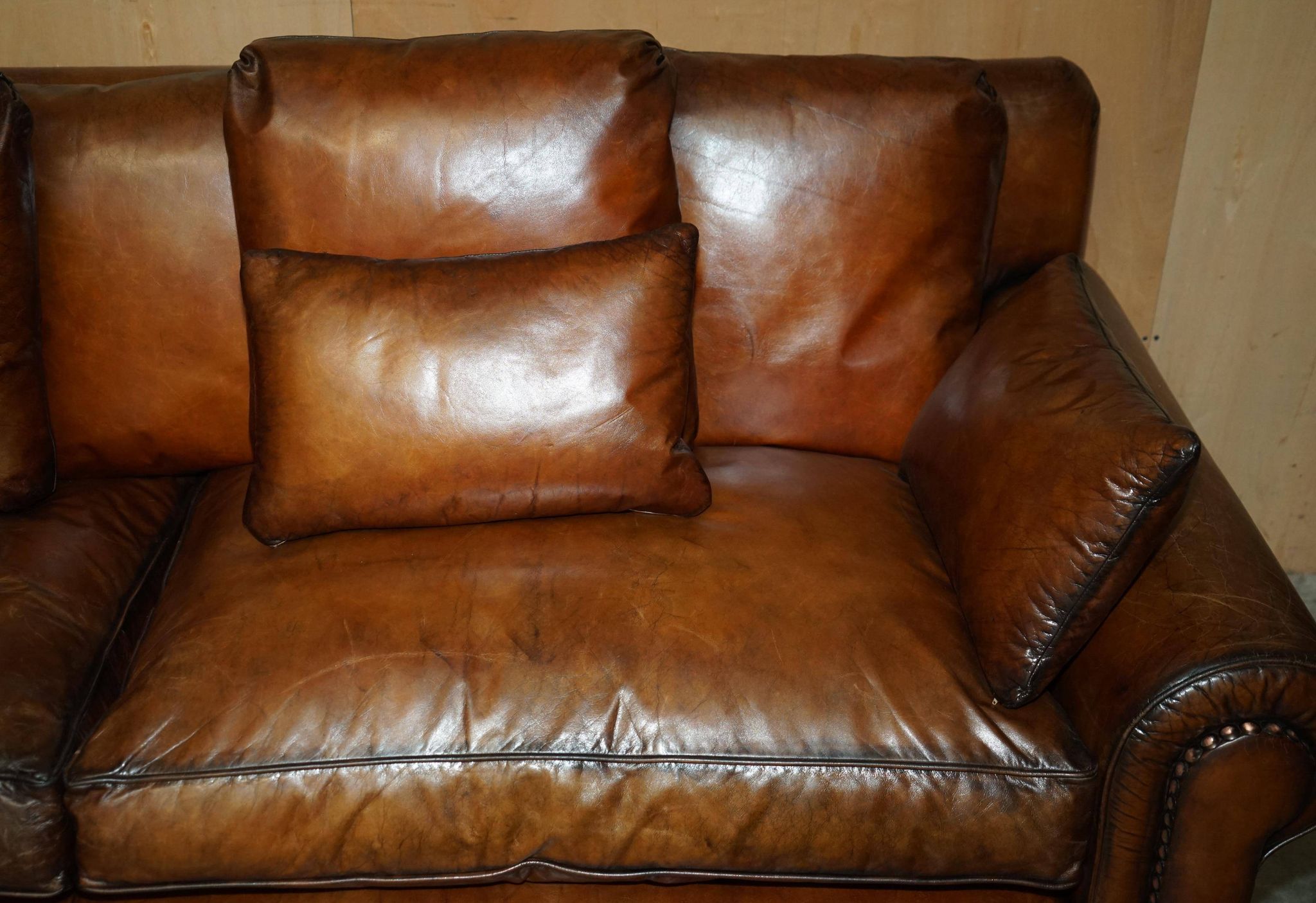 Pair of Ralph Lauren Jamaica club sofas restored in leather.