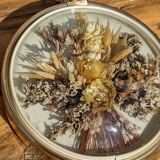 Domed frame of dried flowers