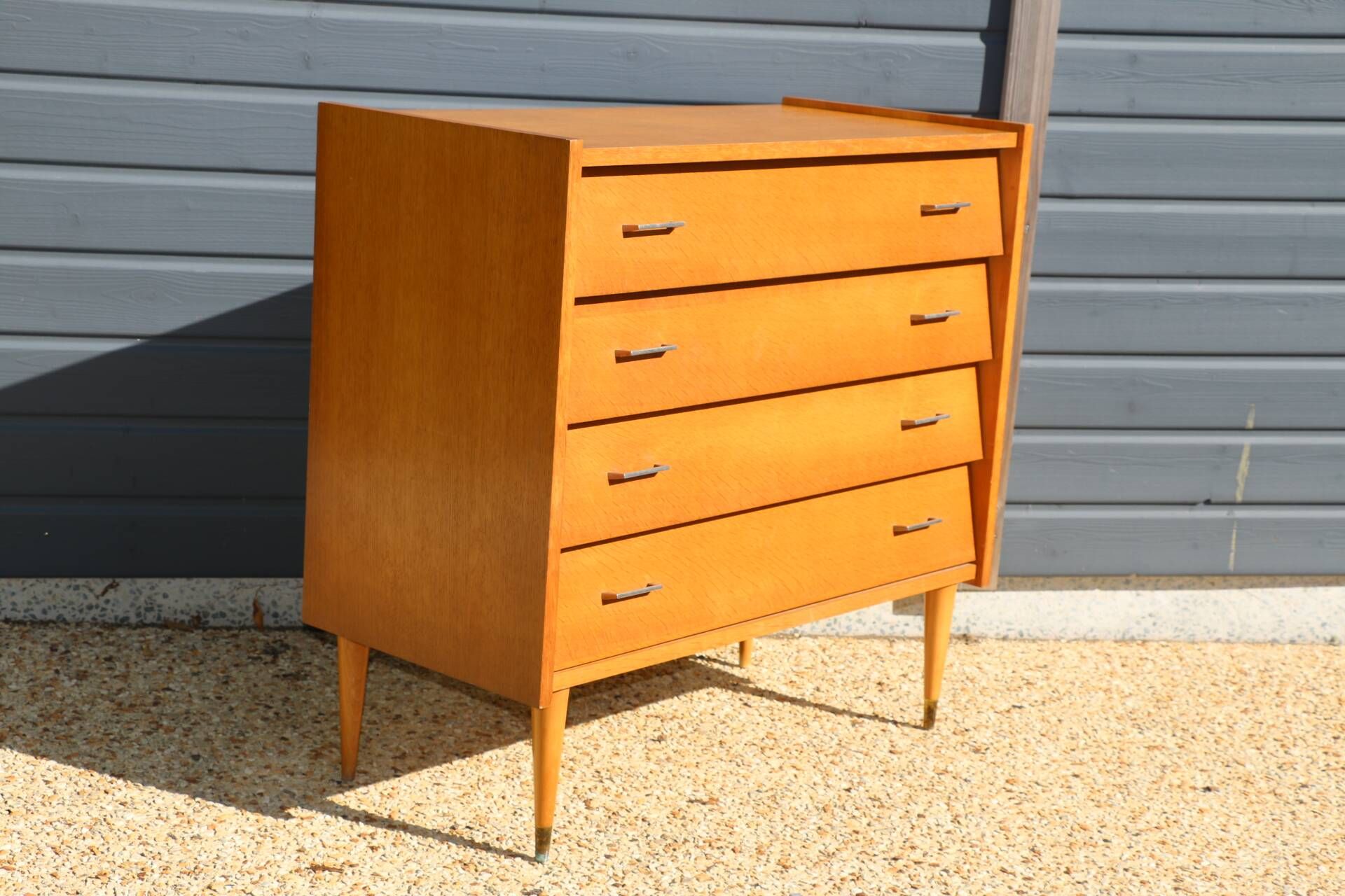 Light oak chest of drawers with 4 drawers from the 1960s.
