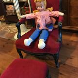 Old children's armchair with foot rests