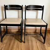 Paire de chaises noires + simili blanc