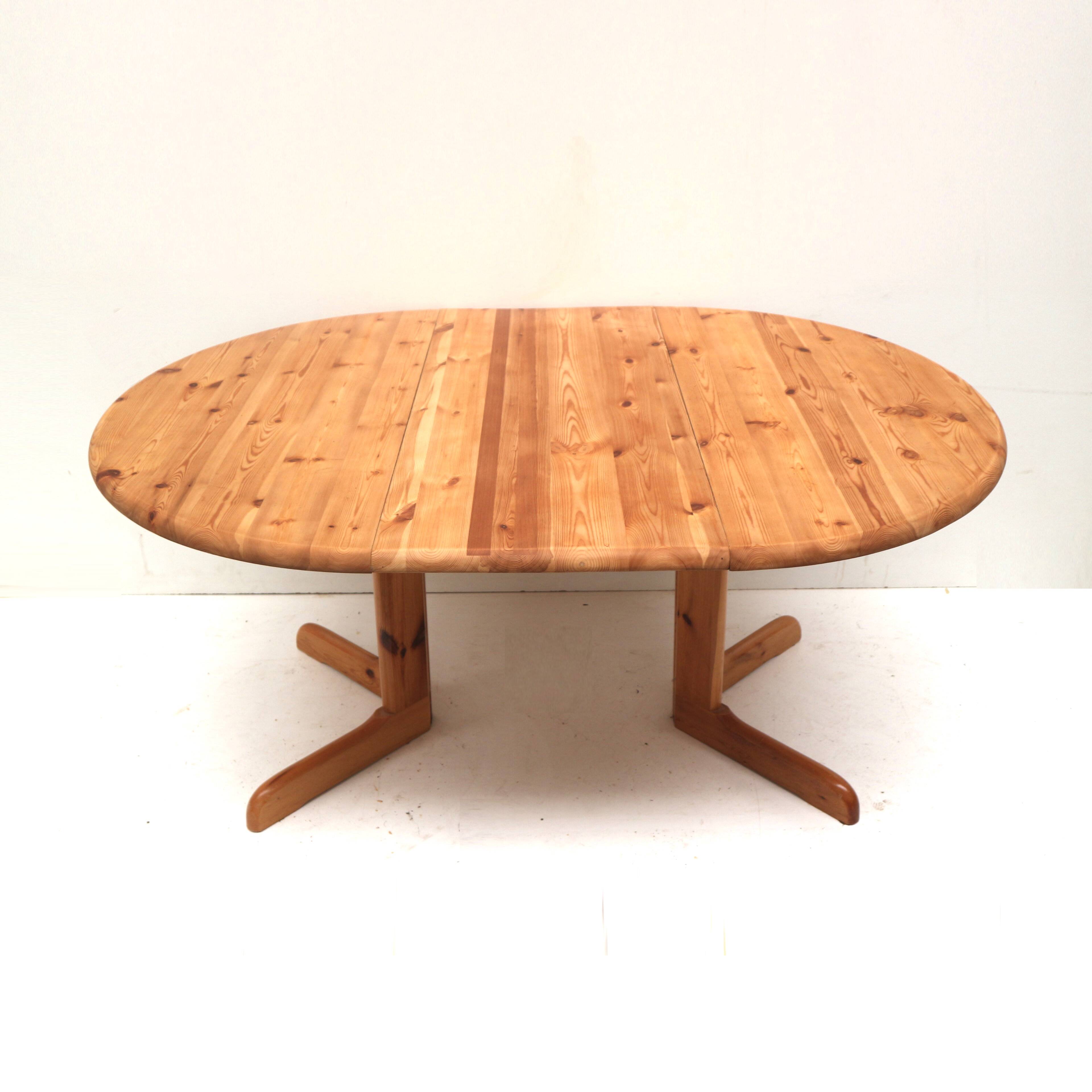 Vintage extendable pine dining table made in the 1970s