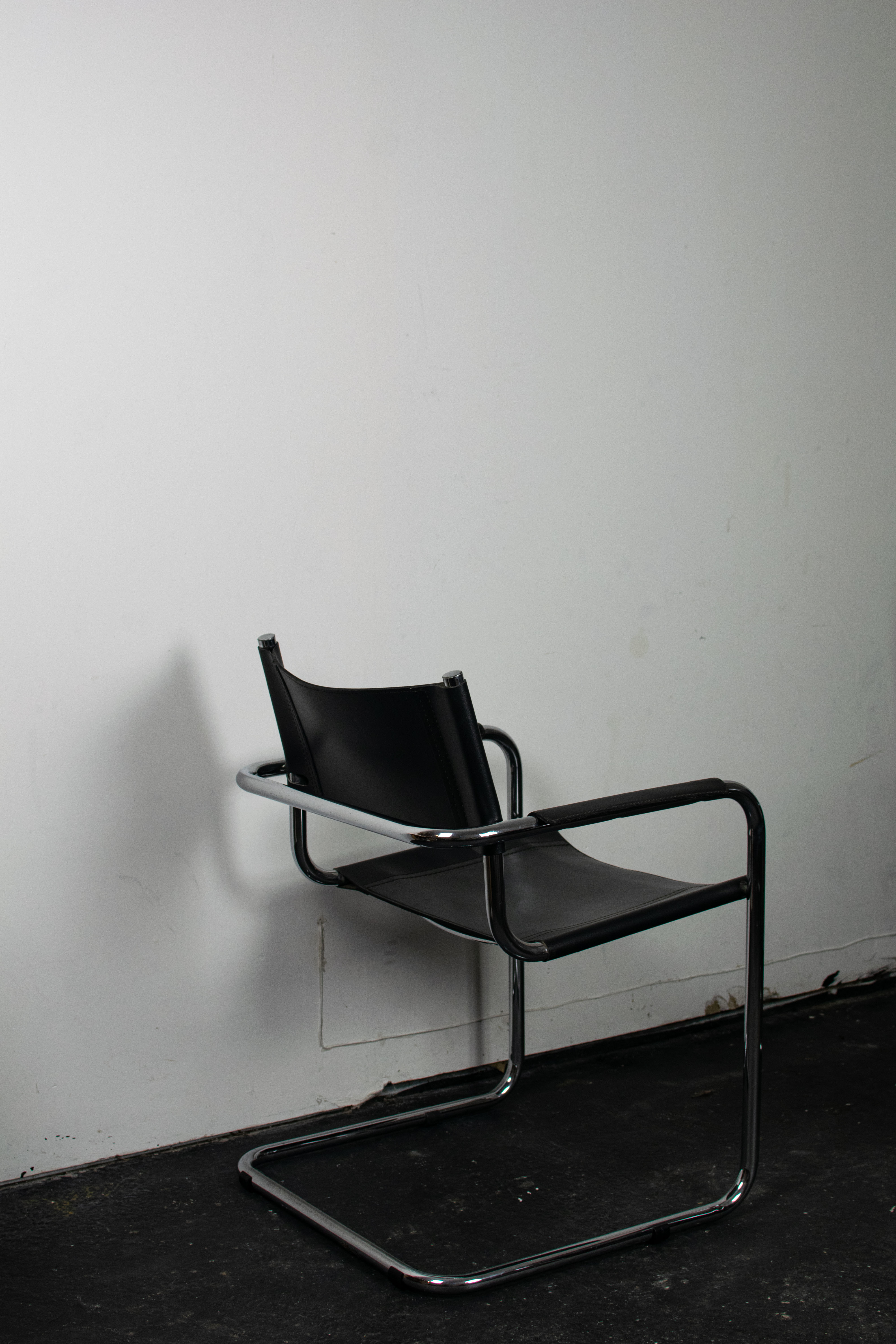 Black leather cantilever armchair 70s-80s