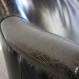 Black grained cowhide leather armchair