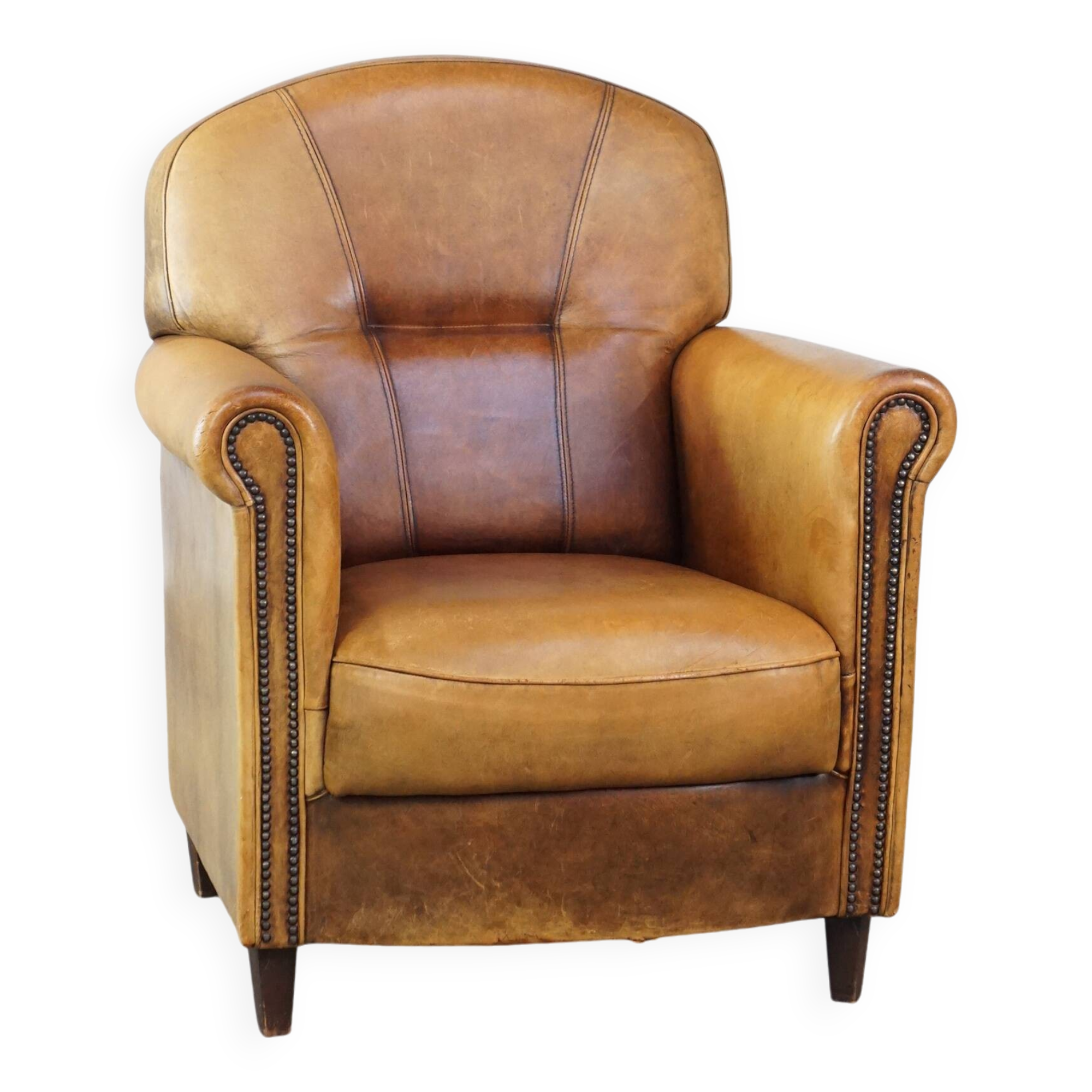 Stately, sleekly finished, comfortable sheepskin armchair