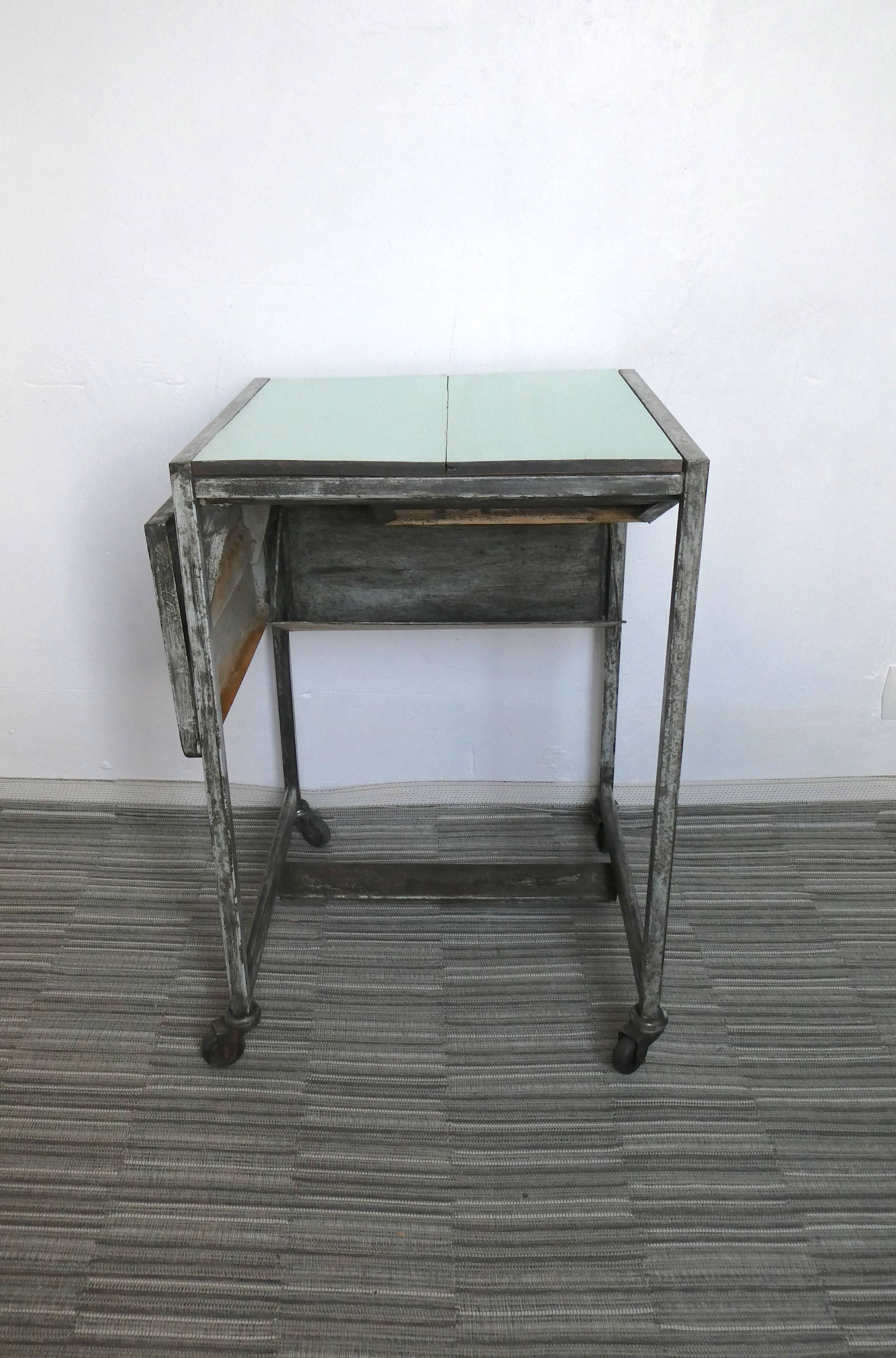 Industrial storage, workshop, in metal and wood, furniture on wheels