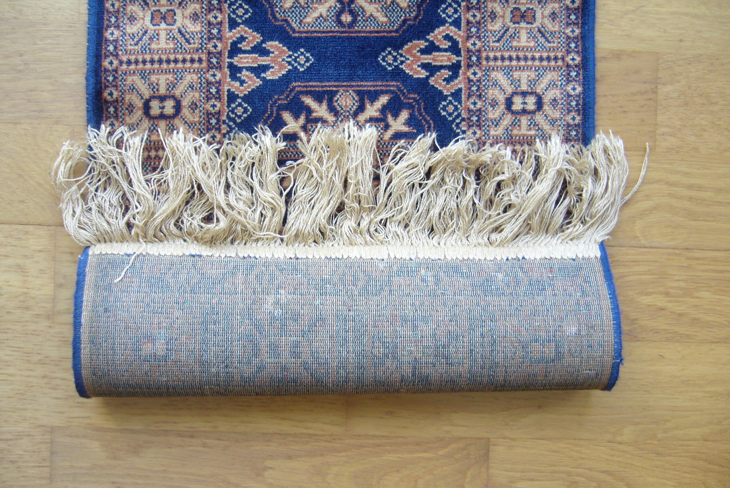 Three oriental rugs 35 x 70 cm