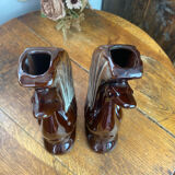 Pair of ceramic vases in the shape of swans.