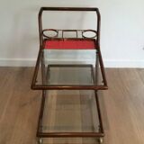 Rolling table made of wood, brass and glass