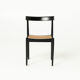 Mid-century dining chair in black laquered wood and cane