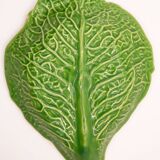 Trompe l'oeil cup bright green cabbage leaf in slip