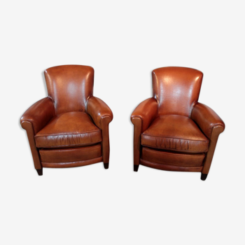 Pair of club chairs in leather