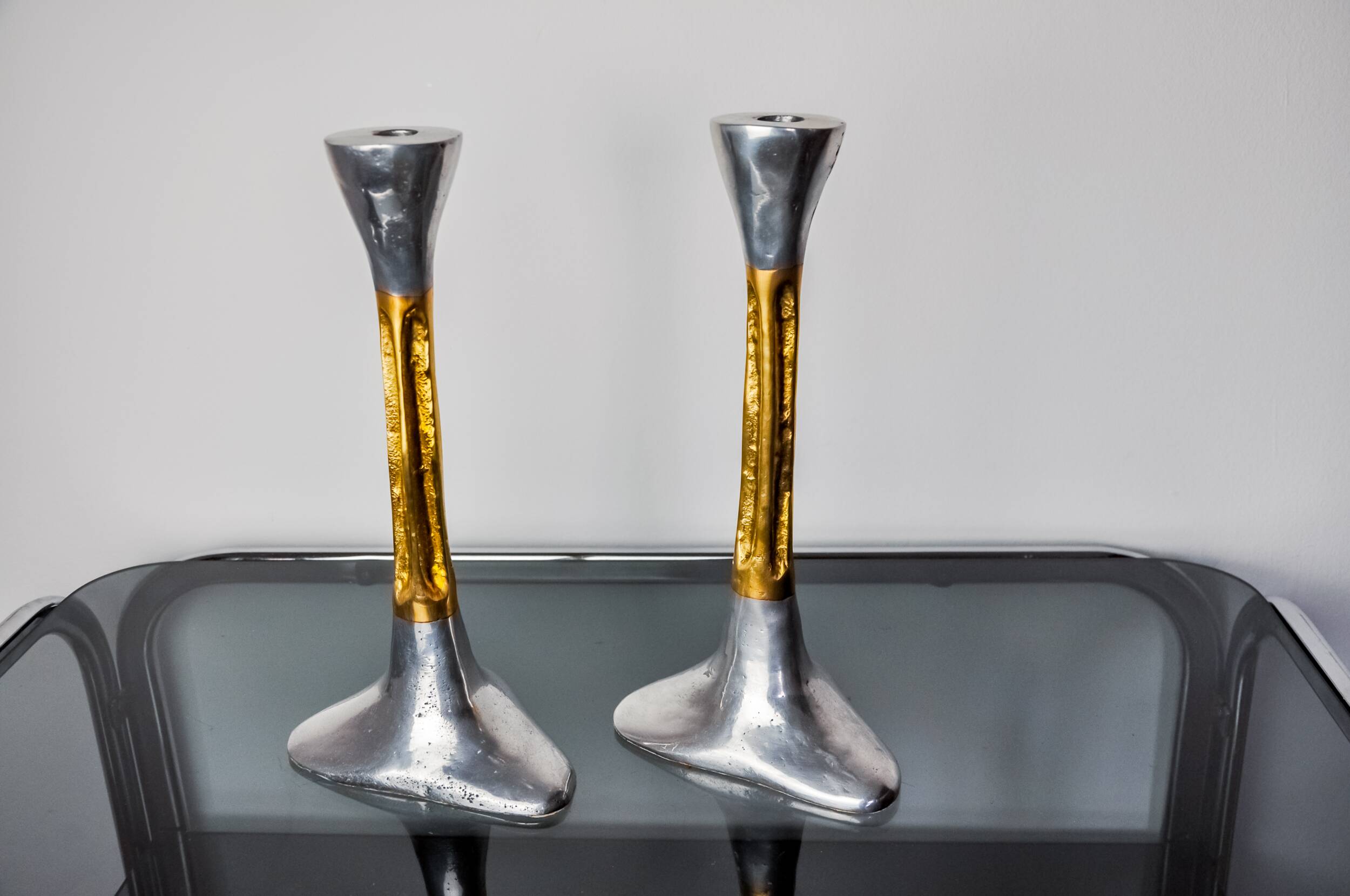 Pair of Brutalist candlesticks by David Marshall, bronze and aluminum, Spain, 1970